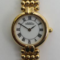 Michel Herbelin gold tone ladies quartz watch, 24mm wide inc. button. Condition report: In working