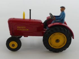A boxed Dinky Toy Massey Fergusson tractor No. 300, loss to tractor box.