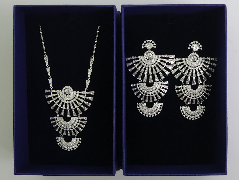 Swarovski crystal necklace and matching earrings, both boxed, earrings 70mm.