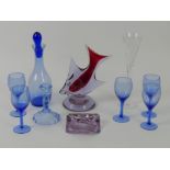 A quantity of glassware including a Waterford crystal wine glass, a blue glass decanter set and a