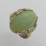 9ct gold celadon jade and diamond ring, 5.3 grams. Size K 20 mm wide.