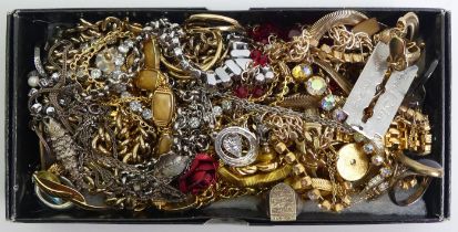 A box of mixed jewellery including silver rings and necklaces.