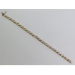 9ct yellow and white gold diamond bracelet, 8.3grams, 19.5cm x 5.5mm.