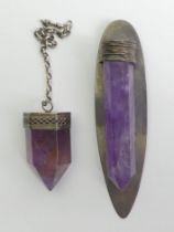 Two large silver (tested) and amethyst crystal pendants, 92 grams. Largest 107 mm long.