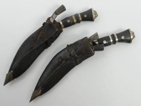 Two 1930's kukri with scabbards, blades 15cm.
