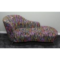 A modern chaise lounge in a striking peacock design fabric. 170 cm long.