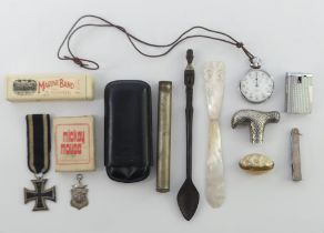 A box of items including a silver topped cane handle, a silver darts medal and Iron Cross and a