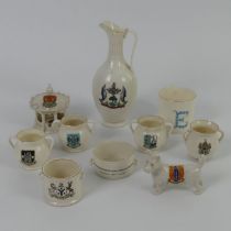 Ten crested ware items including a large Goss jug and an Arcadian bandstand 20cm.
