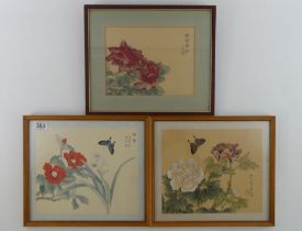 Three framed and glazed Japanese woodblocks with flora and fauna, 32cm x 39cm.