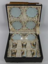 A twelve piece Victorian china cup and saucer set in a fitted box, 13cm x 30cm.