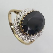 9ct gold sapphire and diamond ring, 4.5 grams, 18.7mm, size O.