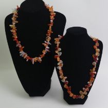 Two carnelian irregular bead necklaces, 217 grams.