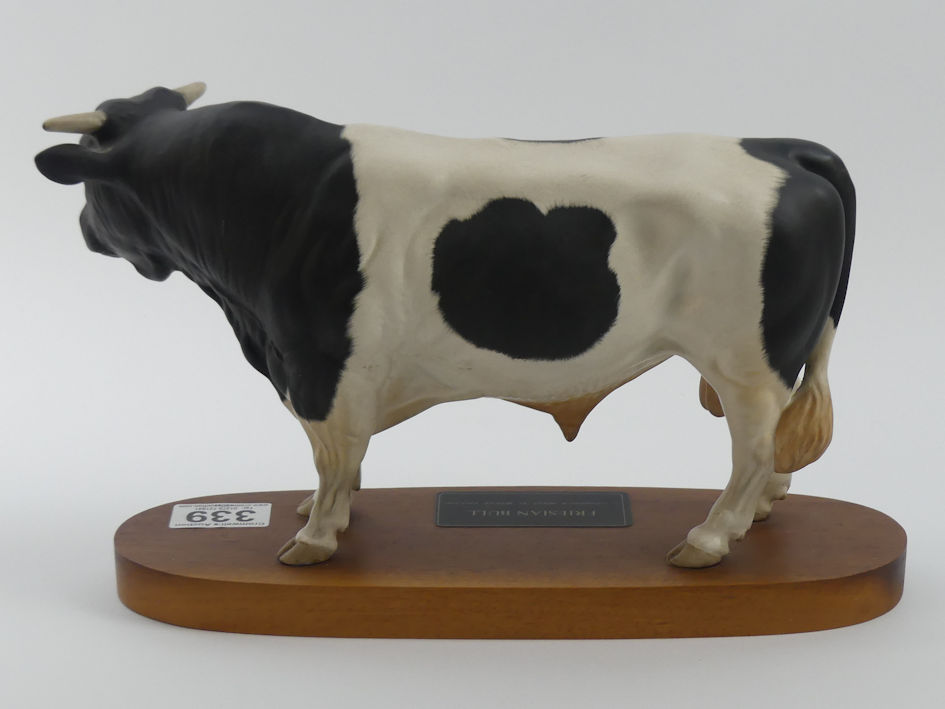A Beswick Friesian bull on a wooden plinth designed by Graham Tongue, A2580, 19cm x 29cm - Image 2 of 3