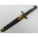 A WWI shortened Italian model 1870/16 bayonet with scabbard, marked Torino, blade 23cm.