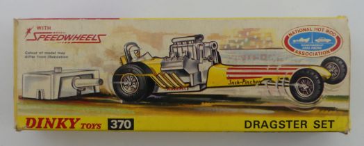 A boxed Dinky Toys 370 Dragster set, early card box issue, with pictorial card plinth, foam