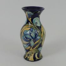 A Moorcroft floral design vase modelled by Emma Bossons No 28/50 20cm.