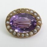 Victorian 15ct gold (tested) amethyst and seed pearl brooch, 5.1 grams. 24 x 19 mm.