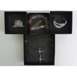 Butler & Wilson boxed jewellery including a dark crystal necklace and matching bracelet, (6 items).