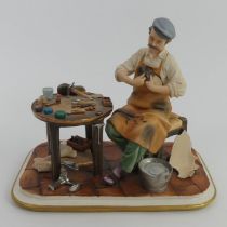 A Capodimonte figure 'The Cobbler' modelled by Sandro Maggiori, signed and dated to base 1978,