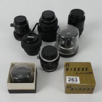 Seven Nikon lenses including AF Nikkor 14mm 1:35 - 4.5.