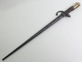 French model 1874 Gras sword bayonet with scabbard, marks to the blade. Blade length 52 cm.