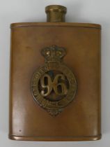 A WWII hip flask with badge to the front 96 regiment. 13 x 10 cm.