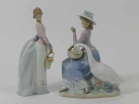 Two Lladro figures, 7622 'Basket of Love' together with 5034 'Goose Trying to Eat', 24cm.