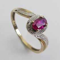 9ct gold ruby and diamond ring, 1.8 grams, 9mm, size R.