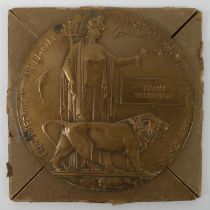 WWI death plaque Harry Boughten in its envelope cover.