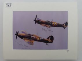 A mounted photograph of two spitfires signed by Tom Neil and Geoffrey Wellam no.47 of 50. 39 x 30