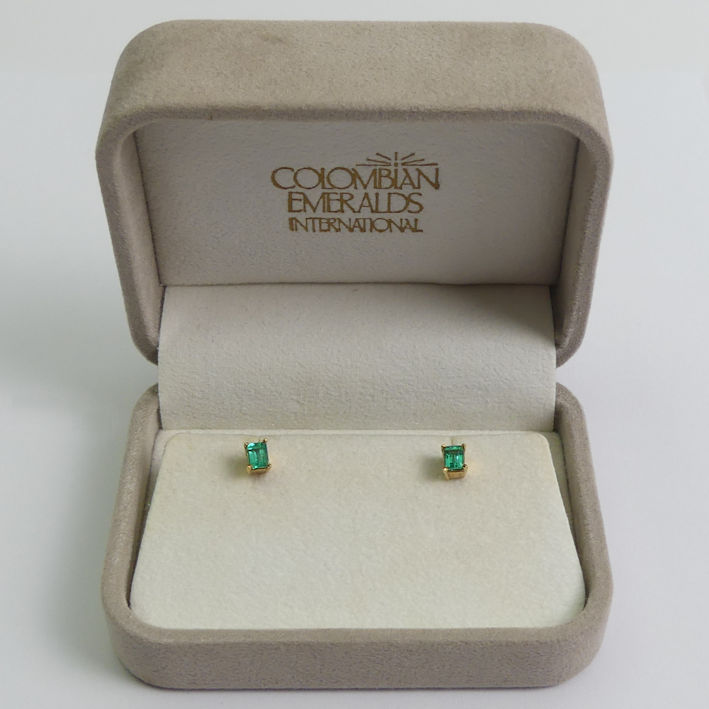 A pair of 18ct gold Columbian emerald earrings, stone size 3.3mm x 4.4mm.