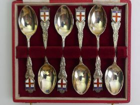 A cased set of six silver and enamel teaspoons, Birmingham 1961, 90 grams.
