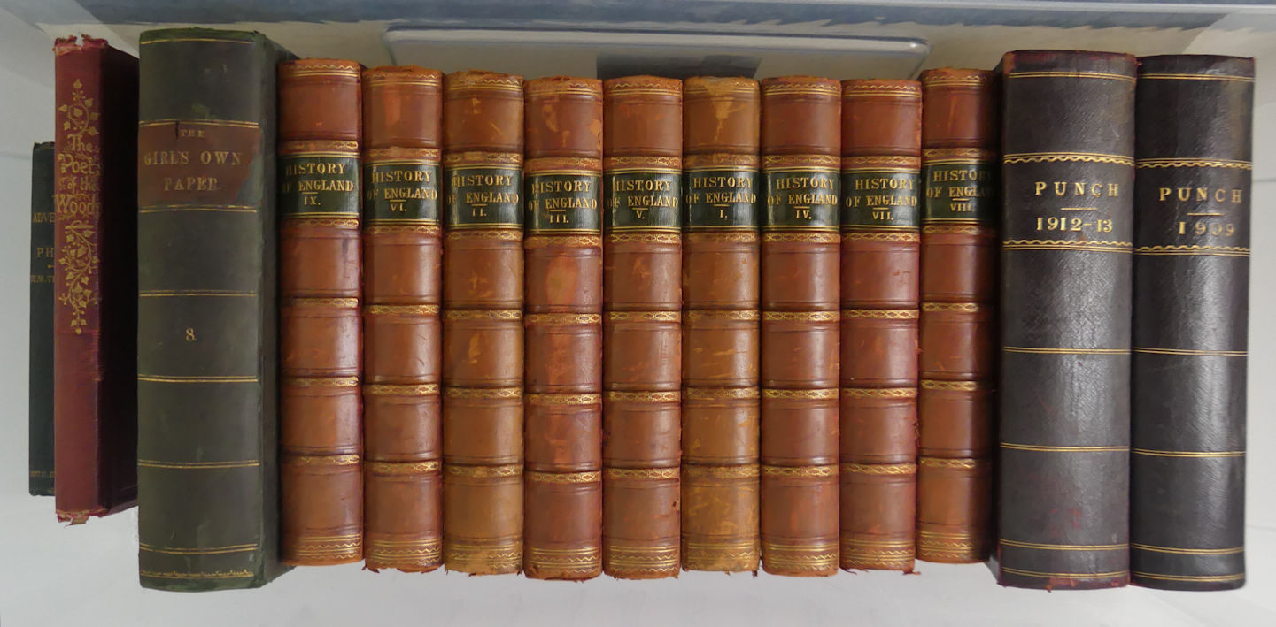 A box of books including nine volumes of History of England by Cassells and two volumes of Punch