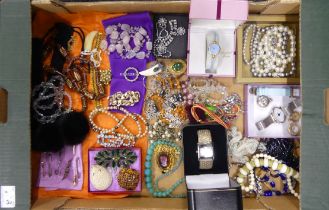 A box of mixed costume jewellery including a rose quartz necklace.