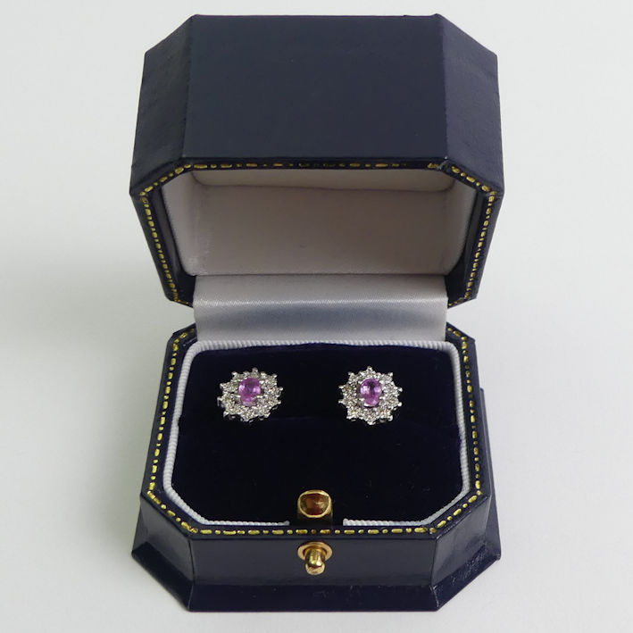 A pair of 9ct white gold pink topaz and diamond earrings, 2.8 grams, 11mm 9.5mm.