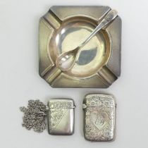 Silver ashtray, salt spoon and two vesta cases, various dates and makers. 83 grams.