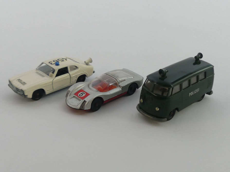 A boxed Siku (German) V235 Super Serie Z Porsche 911 police car, a boxed Siku V212 VW T1 Police