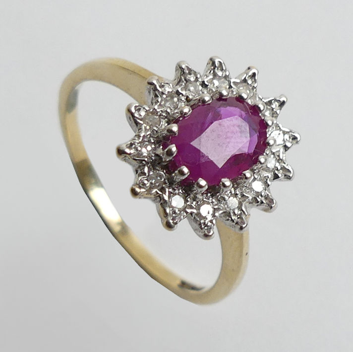 9ct gold ruby and diamond cluster ring, 2.8 grams. Size Q 13.4 mm wide.