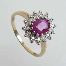 9ct gold ruby and diamond cluster ring, 2.8 grams. Size Q 13.4 mm wide.