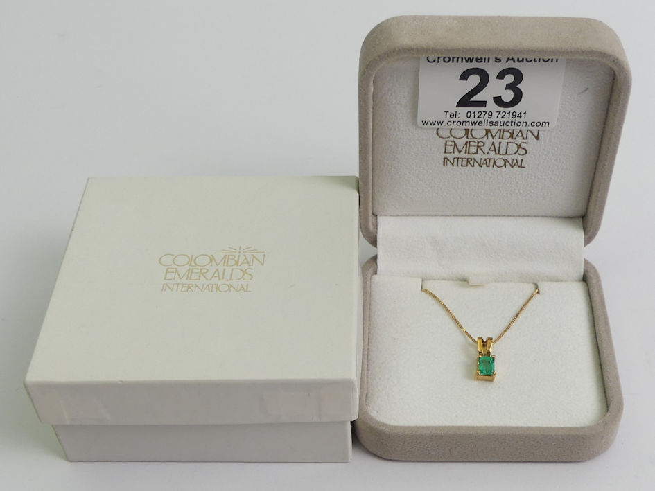 18ct gold Columbian emerald pendant on a 14ct chain, 2.6 grams, pendant 13.mm x 5.5mm. - Image 3 of 3