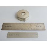 Silver Royal Mail 6 inch ruler, silver mounted 1.5 metre tape measure and a silver page marker.