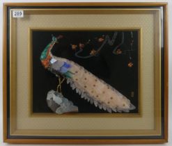 A framed and glazed semi-precious stone collage of a peacock. 60 x 52 cm. Collection only.