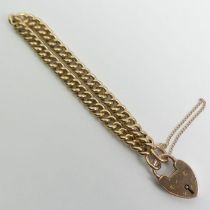 9ct gold curb link gate bracelet, 9.4 grams. 5.7 mm wide.