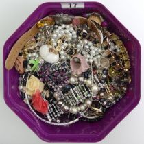 A box of mixed costume jewellery and watches including silver items.