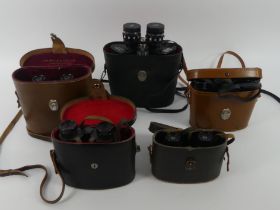 Five pairs of cased binoculars to include Lieberman & Gortz and Carl Zeiss examples.