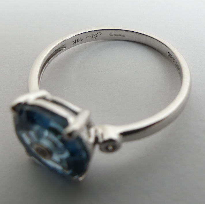 10ct white gold white sapphire and blue topaz ring, 2.1 grams. Size L 1/2 8.8 mm wide. - Image 3 of 3