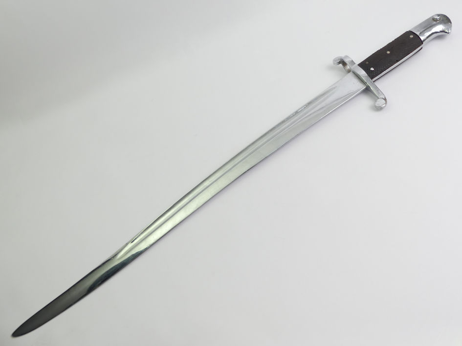 A British 1887 model Martini Henry sword bayonet, blade 57 cm. - Image 2 of 2