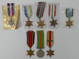 Eight WWII medals, including Atlantic star, Arctic star, Defence medal, Burma star, Africa star with