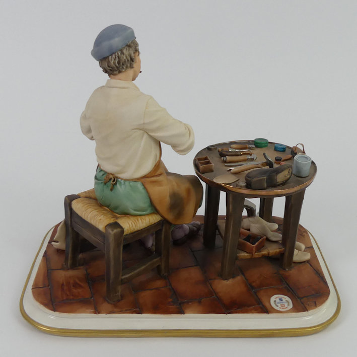 A Capodimonte figure 'The Cobbler' modelled by Sandro Maggiori, signed and dated to base 1978, - Image 2 of 4