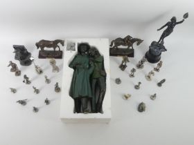A quantity of figures including bronzed racehorses, pewter evergreen figures and a spelter figure '